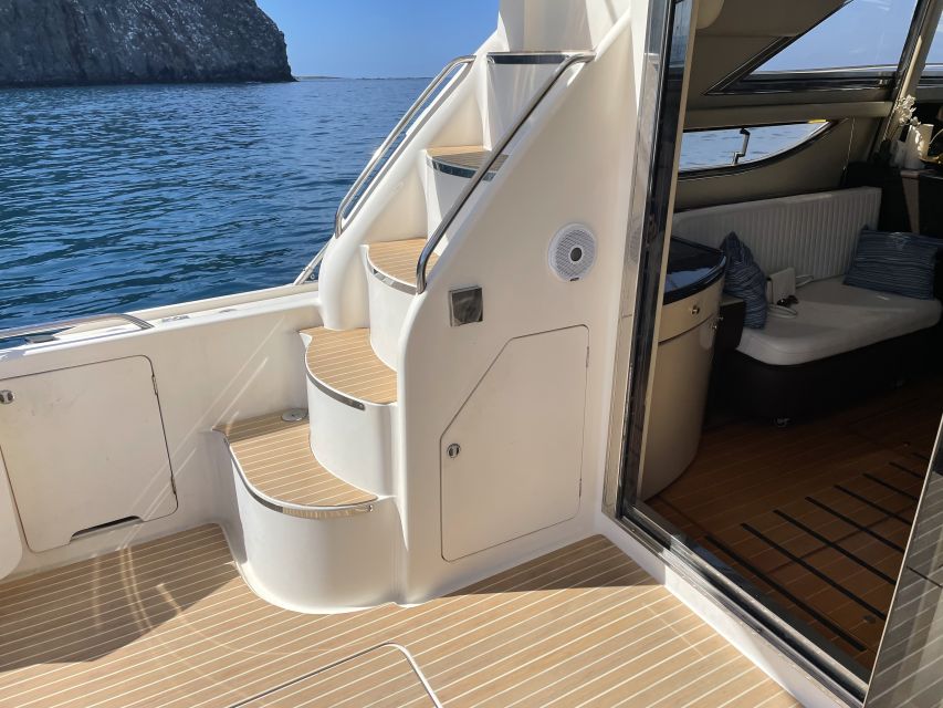 Las Galletas: Private Luxury Yacht Cruise with Lunch - Los Cristianos cliffs and caves, the slow cruise moment you’ll remember