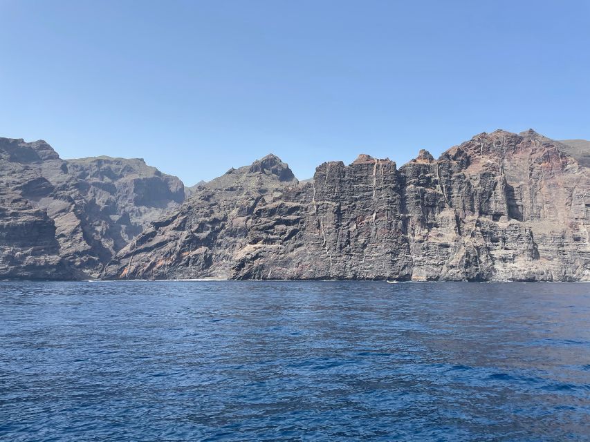 Los Gigantes: Sailing Excursion with Swimming, Drink & Tapas - Tapas, drinks, and the no-music deck vibe