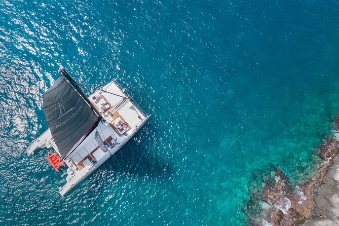 Luxury Catamaran Cruise with Brunch and Unlimited Drinks - On Board Comfort: Beds, Unlimited Drinks, and the VIP Choice