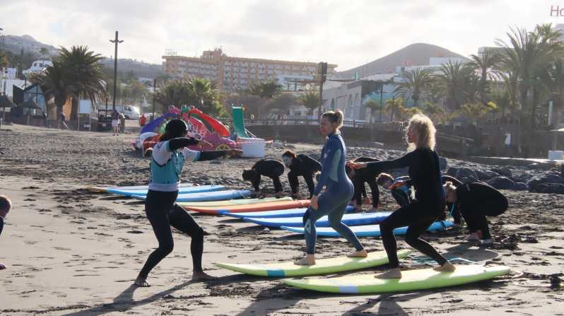 Playa de Las Americas: Surfing Group Lesson with equipment - Part 1 on the beach: Position, paddling, standing, and safety in and out