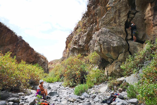 Rock climbing in natural space. - Why the Max Group Size of 4 Makes This Feel Personal