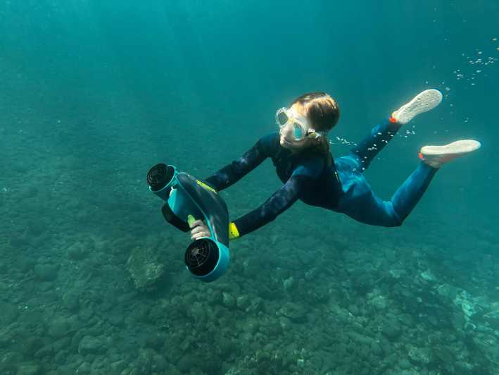 Scooter fun snorcel tour in turtle area - Gear Up: Wetsuit, Mask, Tube, Fins, and the Scooter Itself