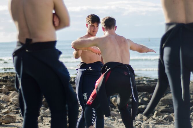 Small Group Surf Lesson in Playa de las Americas - Weather, energy level, and what to do when conditions change