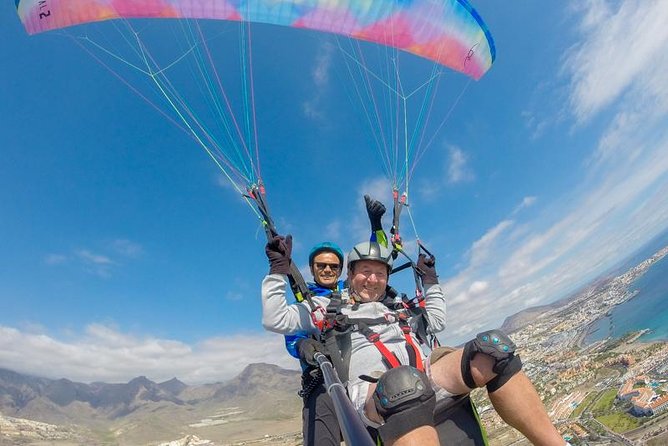 Tandem Paragliding Flight in South Tenerife - In-Flight Views: Coast, Mountains, and Teide in the Distance
