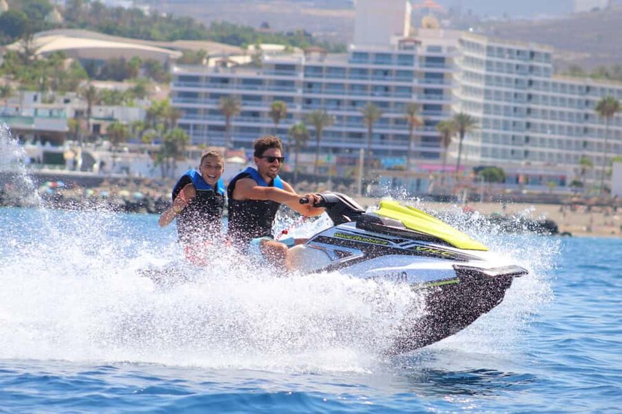 Tenerife: Ocean Pack Jet Ski and Yacht Whale Watching - Jet ski freedom in Puerto Colón, with the safety basics handled
